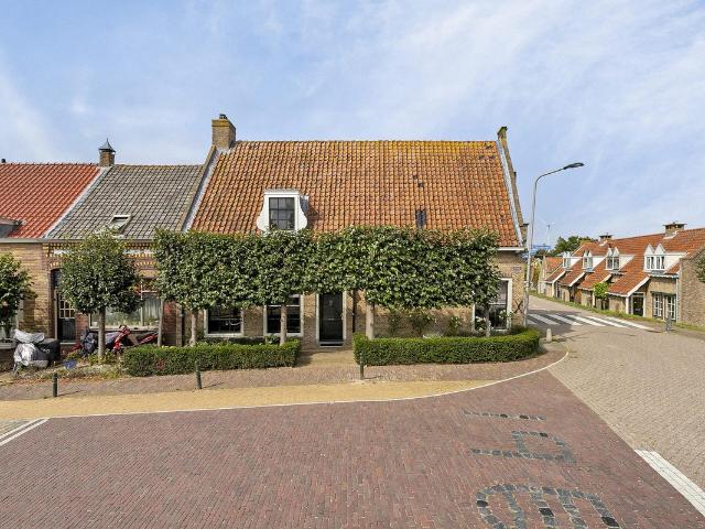Tussenwoning te koop in Piershil, Zuid Holland