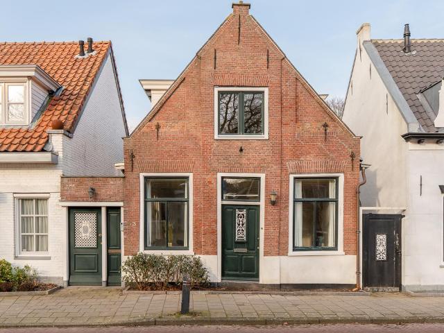 Tussenwoning te koop in Haven, Wassenaar