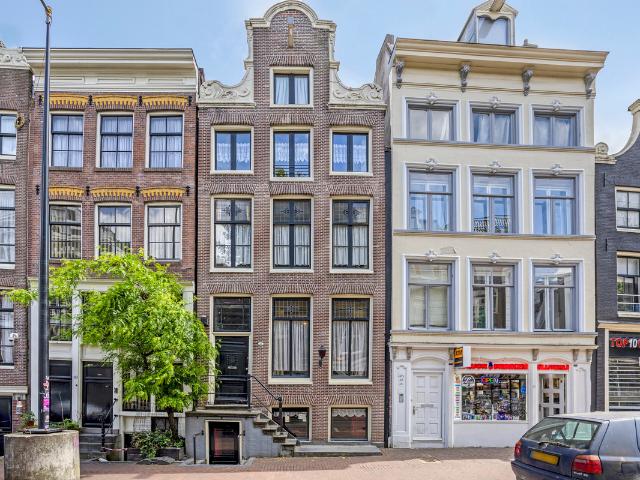 Geschakelde Woning te koop in Centrum, Amsterdam