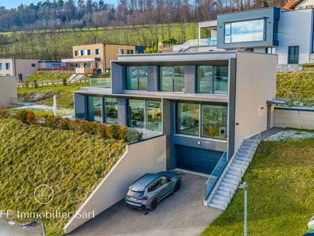 Einfamilienhaus kaufen in Surpierre, Freiburg