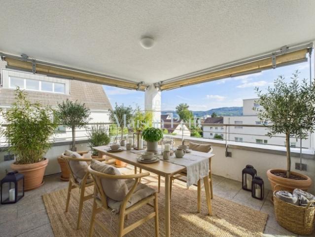 Dachwohnung kaufen in Einigen, Zürich
